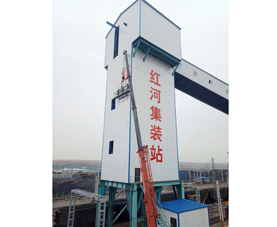 快速定量装车系统是将物料按设定的重量连续地自动称量